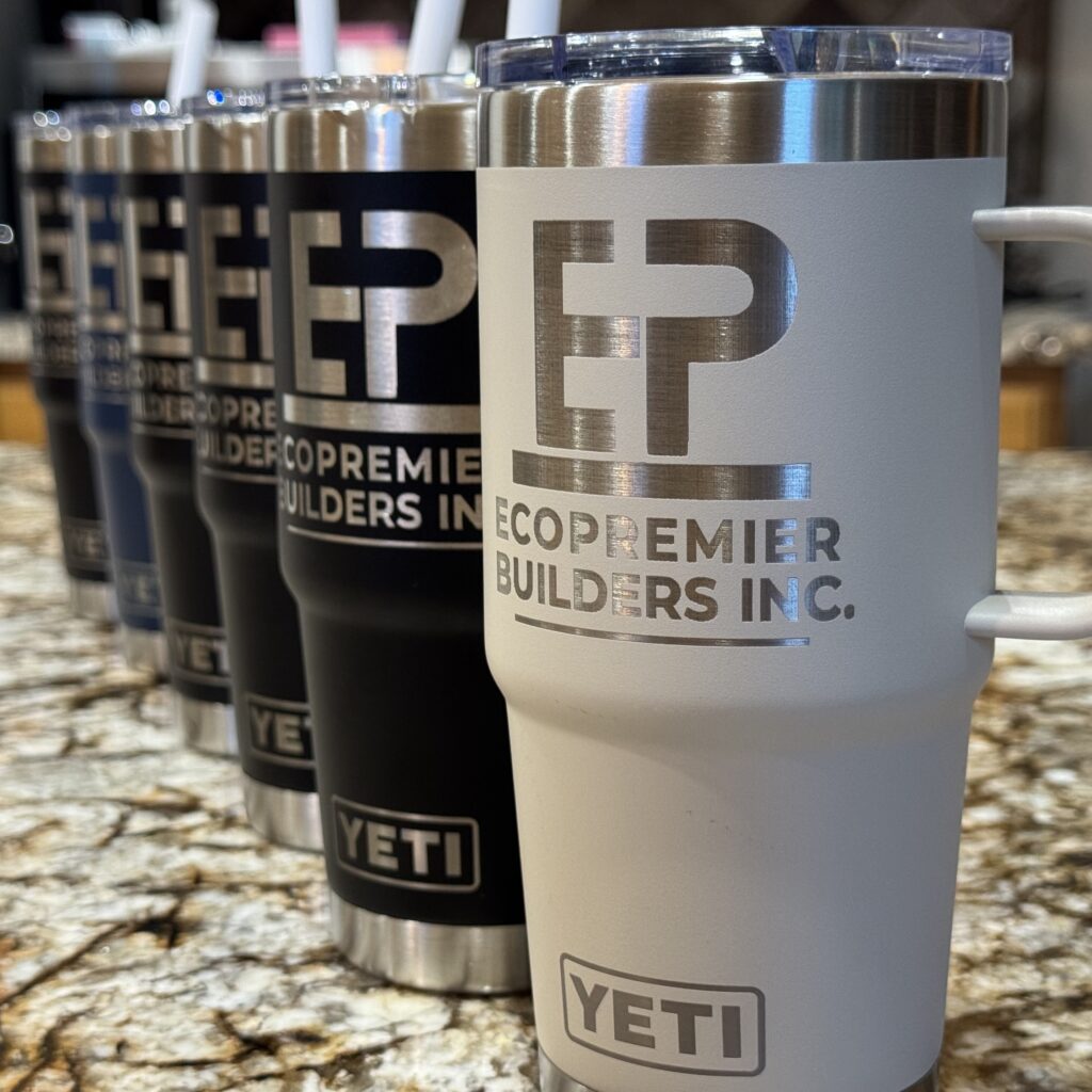 Image showing several Yeti brand tumblers with business logo engraved.